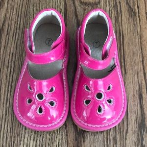 Pink patent squeaky shoes